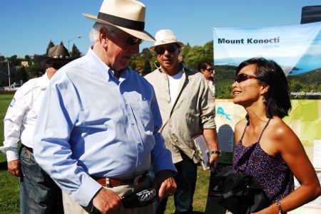 Gigi Stahl, Konocti Trails coordinator for Lake County, Calif., visits with Congressman Mike Thompson at an event in Vallejo, Calif., on Saturday, August 16, 2014. Photo by Mel Orpilla, district representative, Congressman Mike Thompson's office. 081614vallejowinegigi