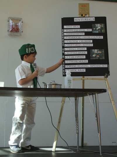 Ethan Lew, age 7, from Cobb Mountain 4-H club talks about farmer's cheese at the annual 4-H Presentation Day on Saturday, February 25, 2012, at East Lake Elementary School in Clearlake Oaks, Calif. 022612student4hday