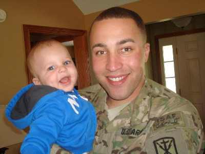 Army Sgt. JaBraun Knox and his young son, Braylon, of Auburn, Ind. JaBraun Knox was killed on May 18, 2012, in Afghanistan. Photo courtesy of Courtney Knox. knoxandson